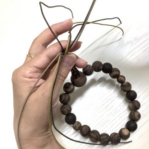 黒柿の念珠の房組み